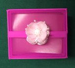 Small pink accordion release box